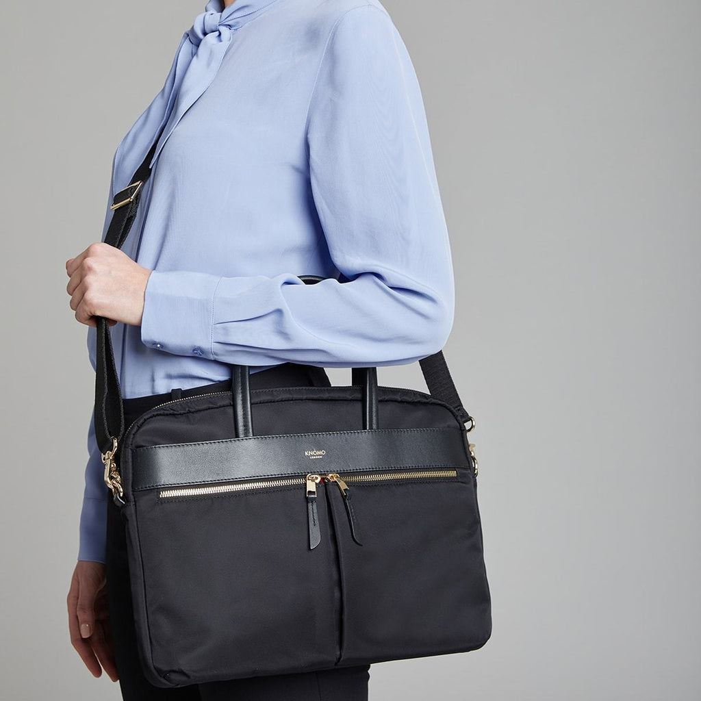 KNOMO Hanover Laptop Briefcase Female Model Wearing Over Shoulder 14" -  Black | knomo.com