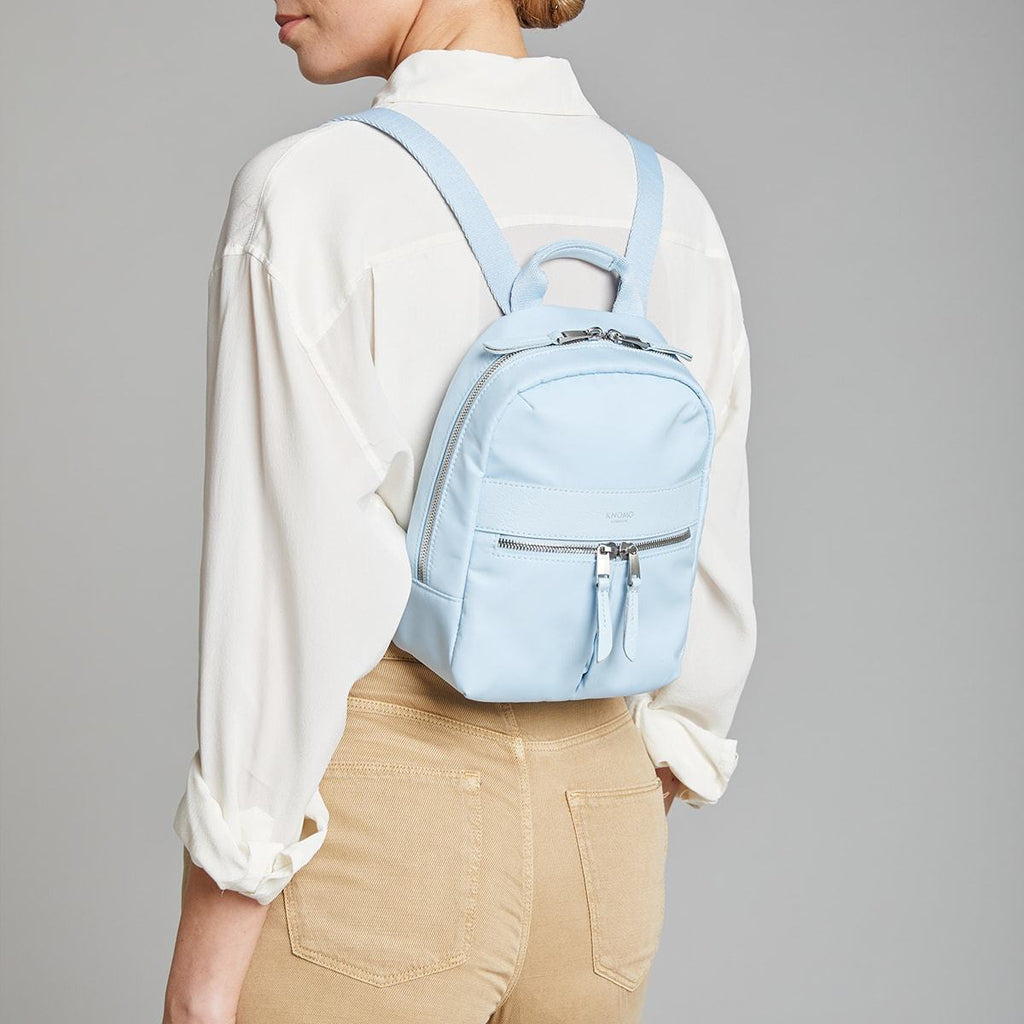 KNOMO Beauchamp XS Backpack Female Model Wearing 8" -  Poplin Blue | knomo.com