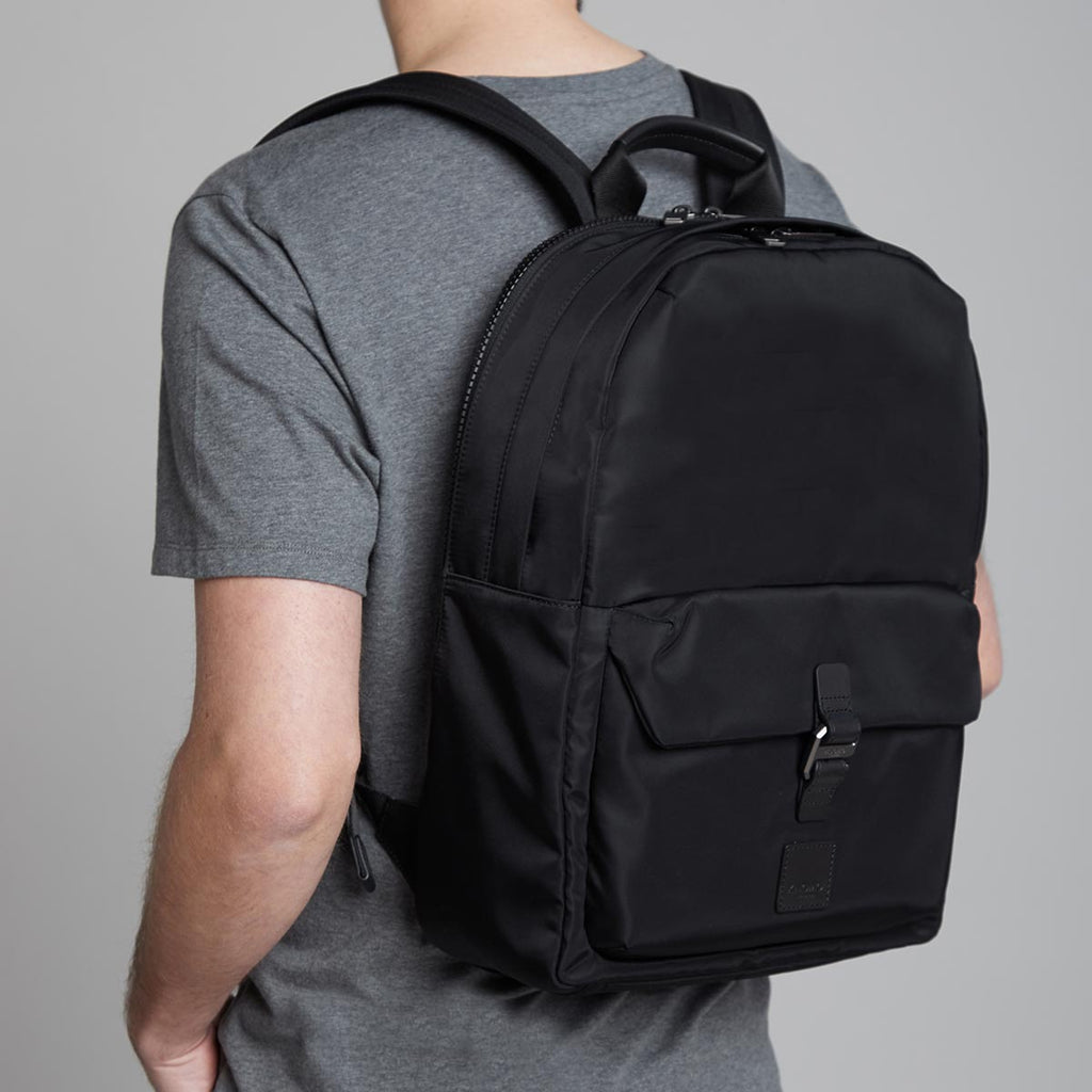 KNOMO Christowe Backpack Male Model Wearing 15" -  Black | knomo.com