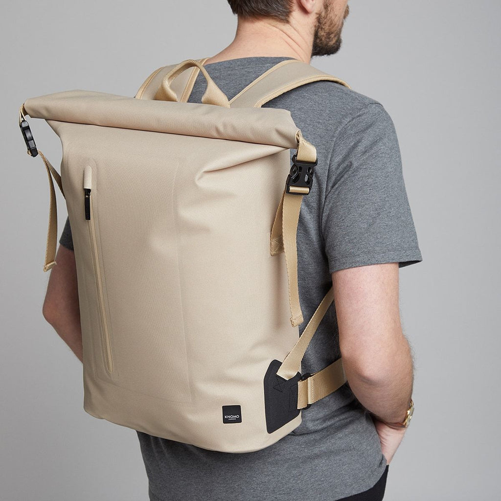 KNOMO Cromwell Roll-Top Laptop Backpack Male Model Wearing 14" -  Desert | knomo.com