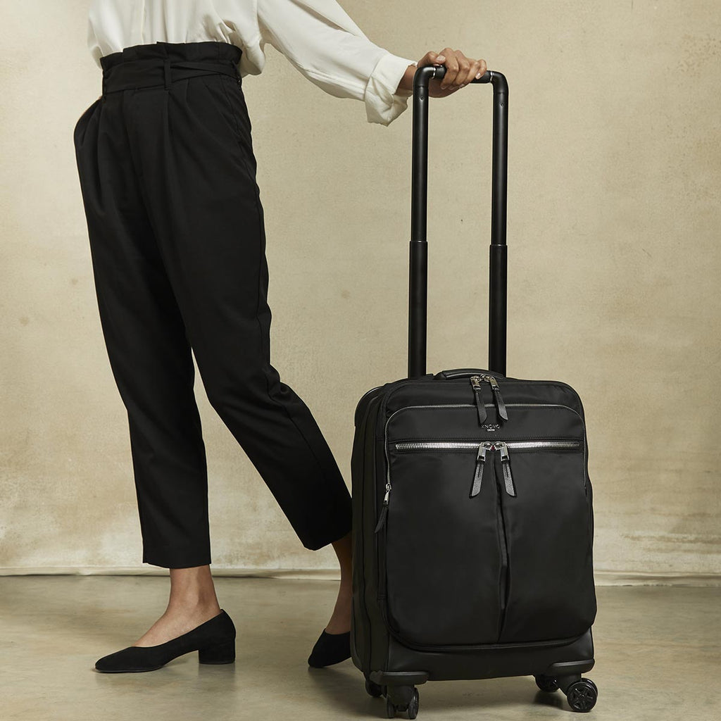 KNOMO Park Lane Boarding Tote Female Model Holding 15" -  Black | knomo.com